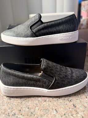 Michael Kors Men’s Black Slip-On Logo Sneakers with White Sole